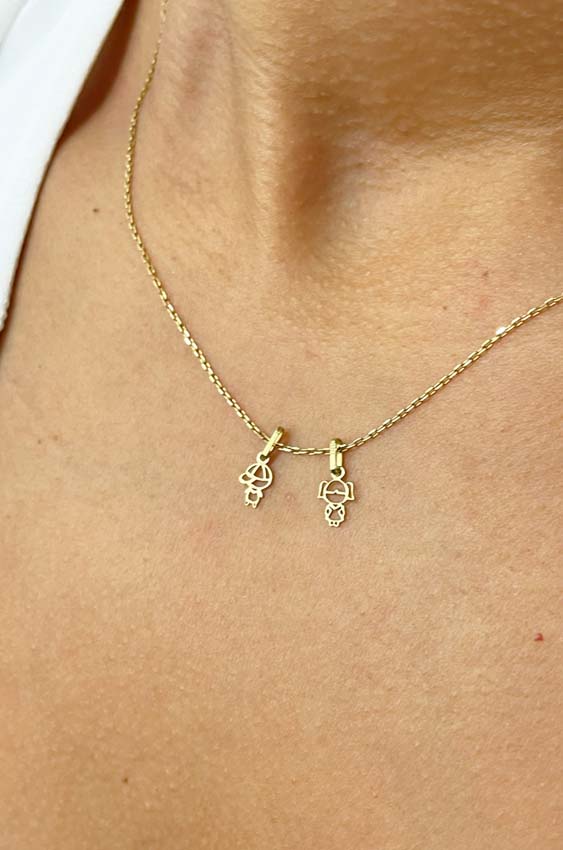 Dijes niñitos en oro 18k