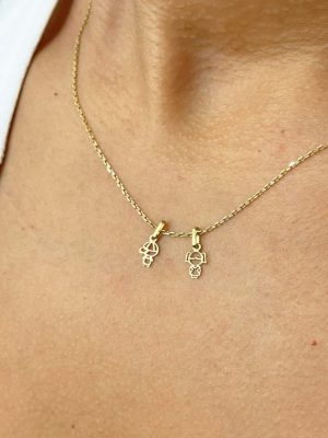 Dijes niñitos en oro 18k