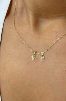 Dijes niñitos en oro 18k