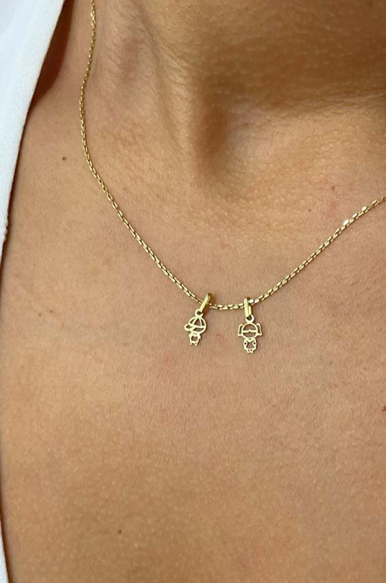Dijes niñitos en oro 18k