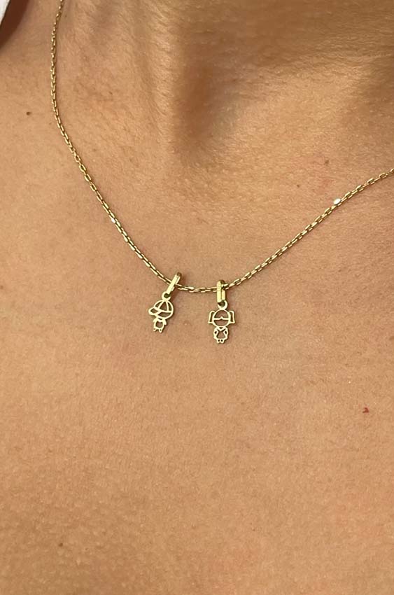 Dijes niñitos en oro 18k