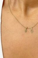 Dijes niñitos en oro 18k